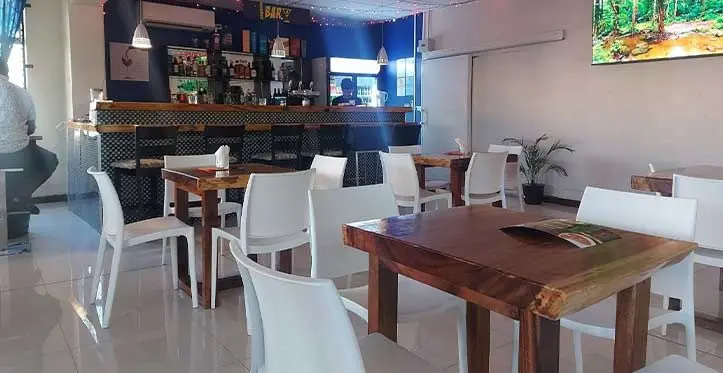 Restaurant staff are ready to serve their customers.