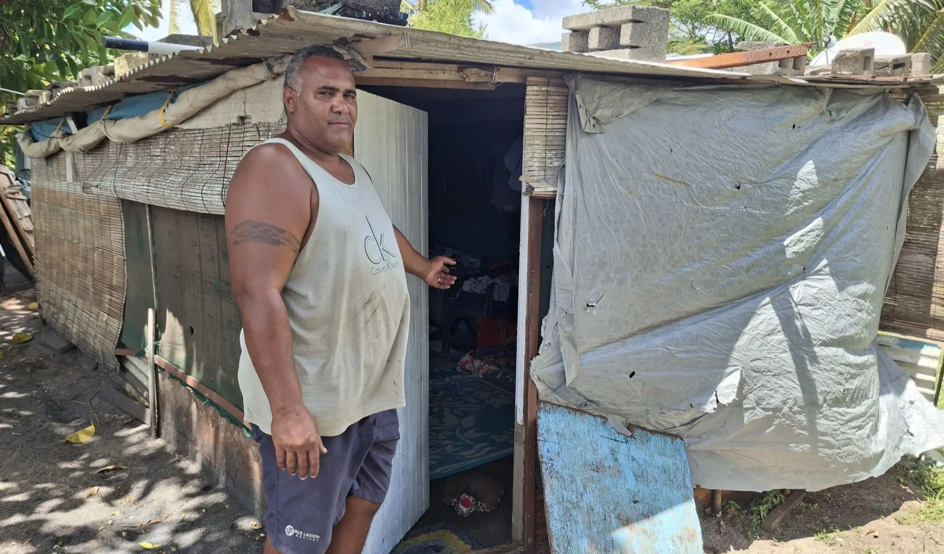Ratu Sione Ravusoni, 47, lives with his wife, eldest son, daughter-in-law, grandchild and three school-aged children in a makeshift shed.