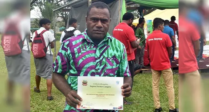 Sakiasi Dakua with his certificate at the Mini Agriculture Show and Agriculture Farm Machineries Exhibition at the Sigatoka Research Station at Nacocolevu,Sigatoka on September 22, 2022. Photo: Salote Qalubau