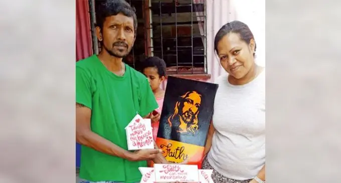 Daniel Nilesh Raj exchanges his paintings for groceries. Photo: Salote Qalubau