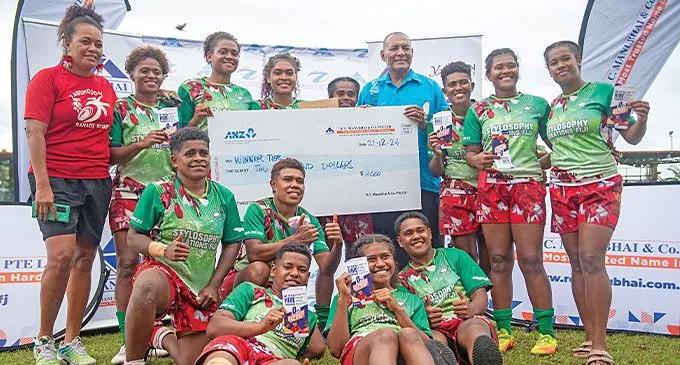 Tagimoucia Ranadi with their $2000 prize money after winning the women’s division at the R.C Manubhai Nataleira sevens tournament at Ratu Cakobau Park, Nausori on December 21, 2024. Photo: Josua Buredua