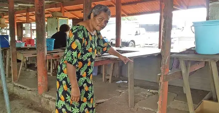 The vendor’s representative, Divulagi Ellen, points at the cracks surrounding their stalls in Labasa on June 23, 2023. Photo: Jone Salusalu