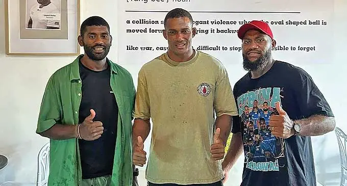 National 7s rep Suliano Volivoli (centre), with brothers Peni Matawalu (left and )Fijian Drua scrum-half Peni Matawalu (left), at The Rugby Cafe in Sigatoka Town. Photo: Leon Lord