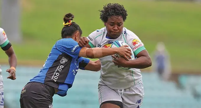 Rooster Chicken Fijiana Drua forward Karalaini Naisewa bursts upfield against Brumbies in the SuperW. Fijiana Drua won 12-7. Photo: Super Rugby