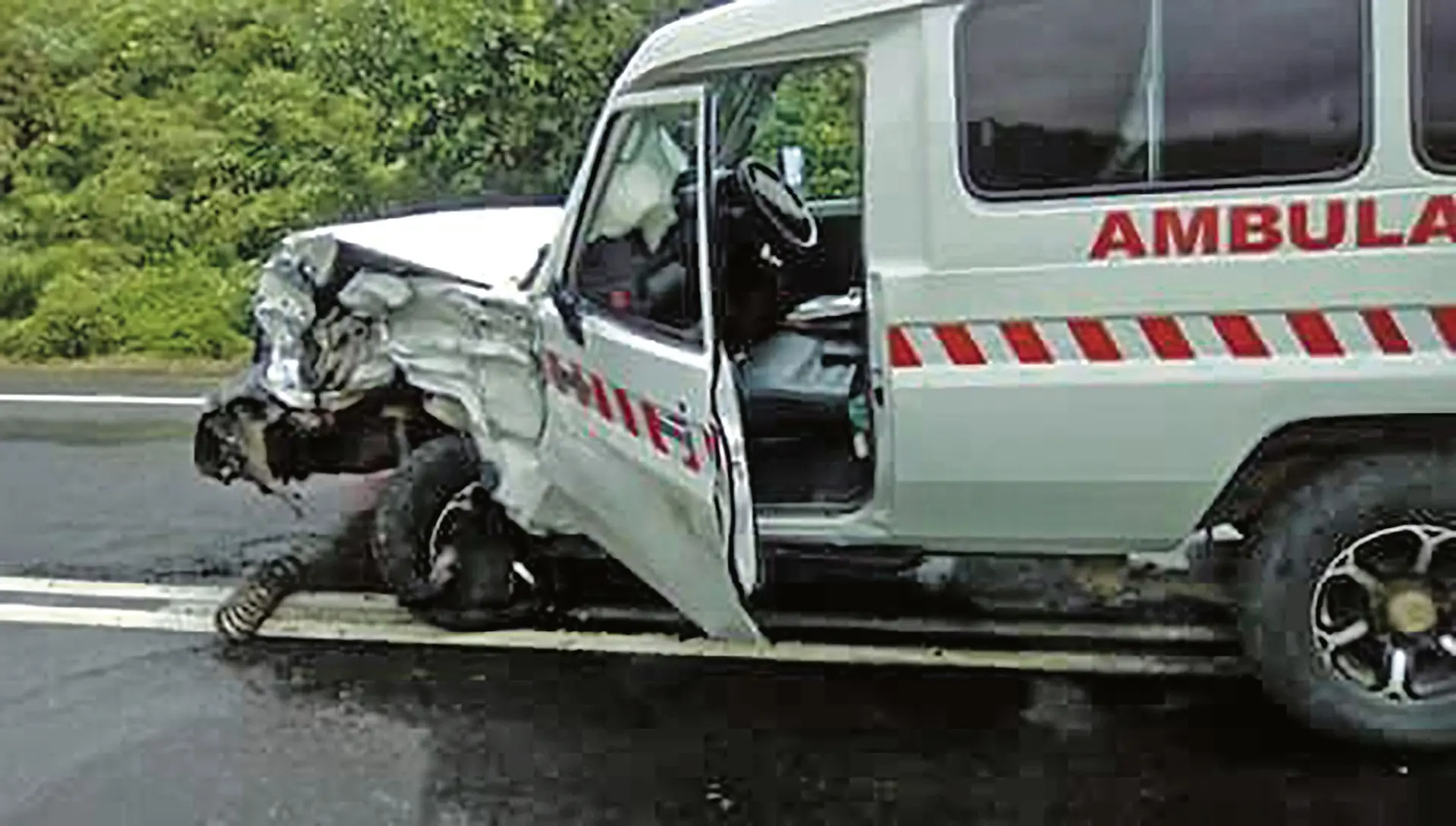 Damages from the collision between the twin cab and the ambulance