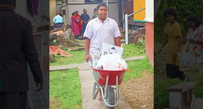 Peni Rawaiwai helping out on the chiefly island of Bau during the Great Council of Chiefs meeting. Photo: Josua Buredua