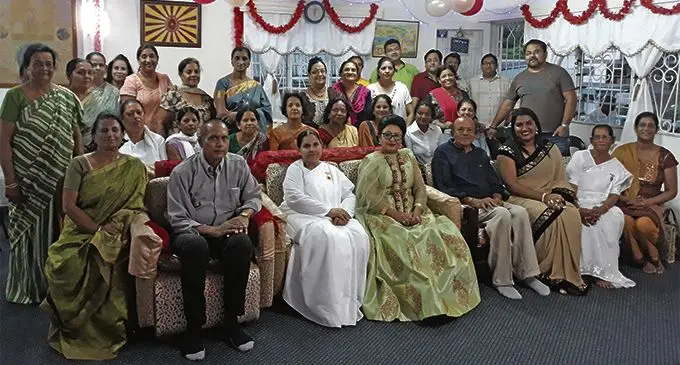 Assistant Minister for Women, Children and Poverty Alleviation Veena Bhatnagar (with garland-sitting) with attendees celebrating the birth of Lord Shri Ram in Suva on April 7, 2019. Photo: Wati Talebula