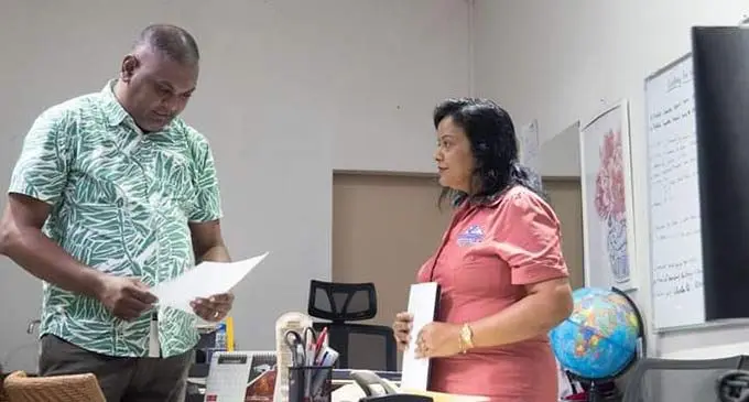 Compliance and Monitoring officer, Vinal Singh (left) conducting inspection at Perfect Property Management in Lautoka.