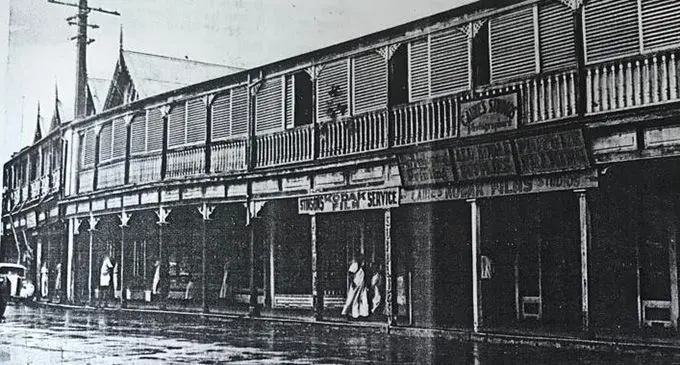 Victoria Parade in 1950 with MacDonald's Hotel at Extreme left. The hotel was wrecked by the hurricane which devastated suva in January 1952. Caine's studio are still in business. Veitaba: National Archives