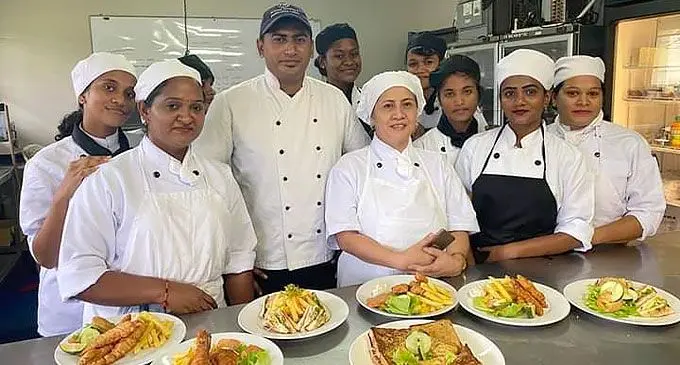 Catering students during a practical class.