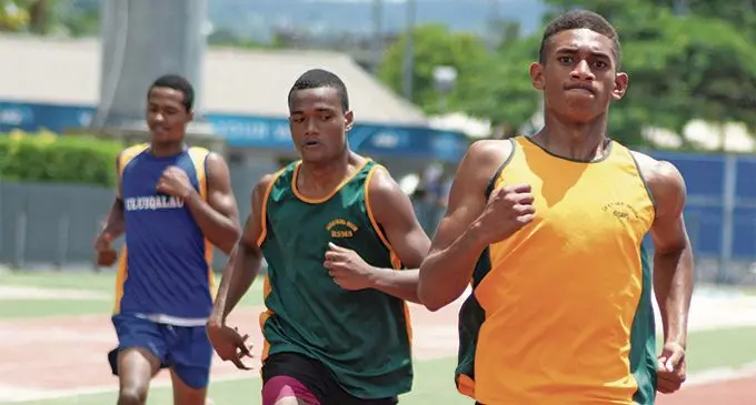 Iferemi Baraki (right) won the inter-boys 200meters heats during RSMS inter-House at ANZ Stadium on February 20, 2019. Photo: Ronald Kumar.