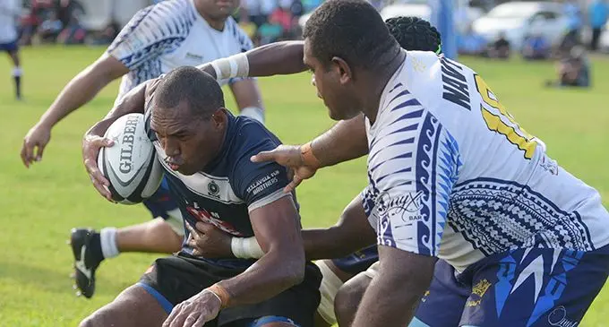 Police wing and former national 7s rep Keponi Paul is mobbed by the Navy forwards during Suva Rugby Union Escott Shield semi- final at Bidesi Park, Suva on June 12, 2019. Story on page 49. Photo:  Ronald Kumar
