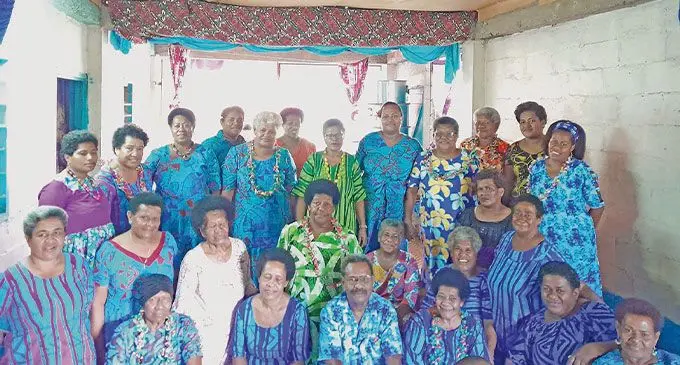 Lako Yani Co-operative Chairman Vueti Kosoniu with women members