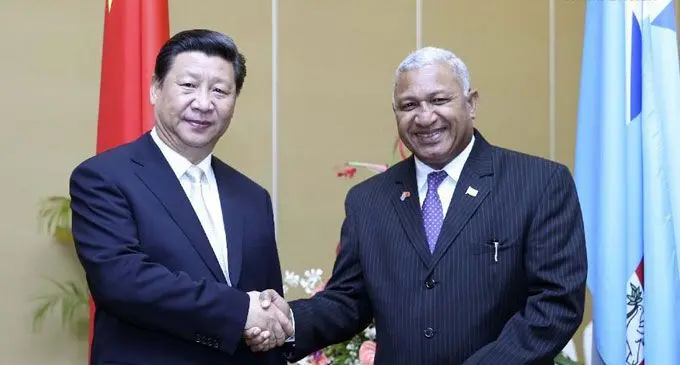 Chinese President Xi Jinping with Prime Minister Voreqe Bainimarama at the Sheraton Fiji Resort on Denarau, Nadi Photo: Xinhua/Yao Dawei