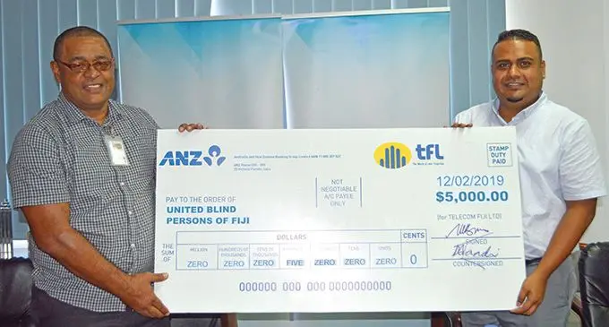 Telecom Fiji Limited Business sales retail, products and marketing general marketing Joseph Naua and National Disability Awards chair Rajnel Prasad.