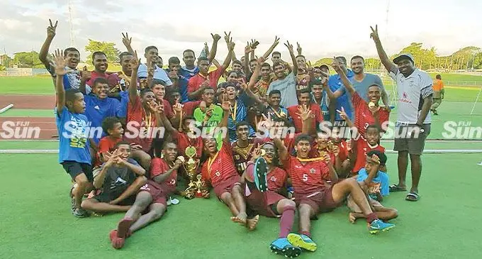 Tilak High School Under-17 players and official celebrate the win. Photo: Waisea Nasokia