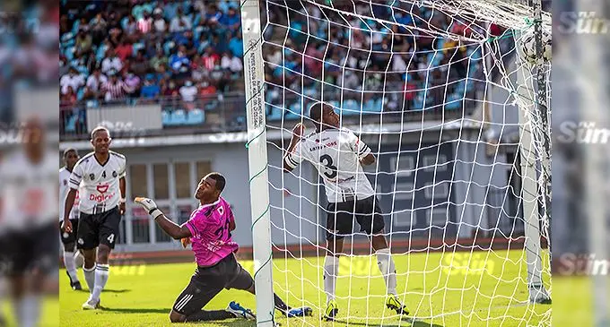 Suva goalkeeper Emori Ragata and defender Meli Codro look helplessly as Anare Apenisa’s attempt hits the roof of the net at the ANZ Stadium, Suva, on December 12, 2021. Photo: Leon Lord
