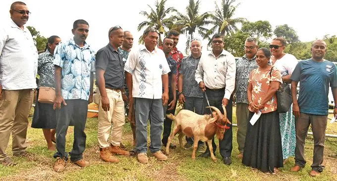 Minister for Agriculture, Waterways and Environment Mahendra Reddy (fifth from right) with Sigatoka goat farmers. Photo: DEPTFO News.