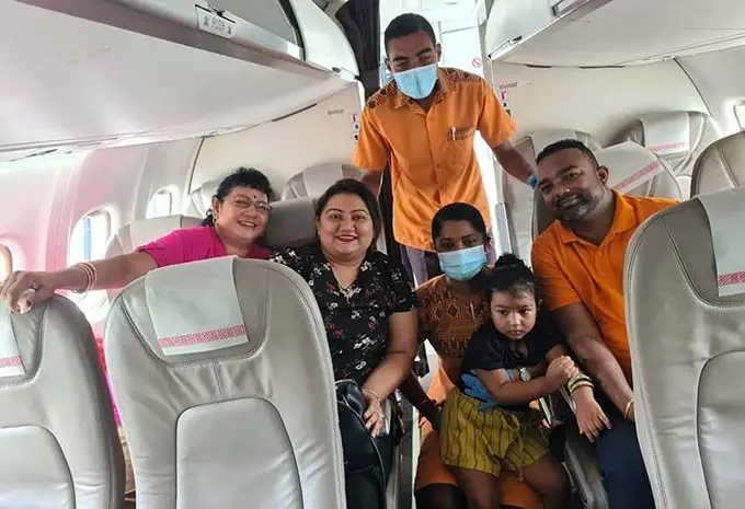 The Nand family of Lautoka with the Fiji Link cabin crew.