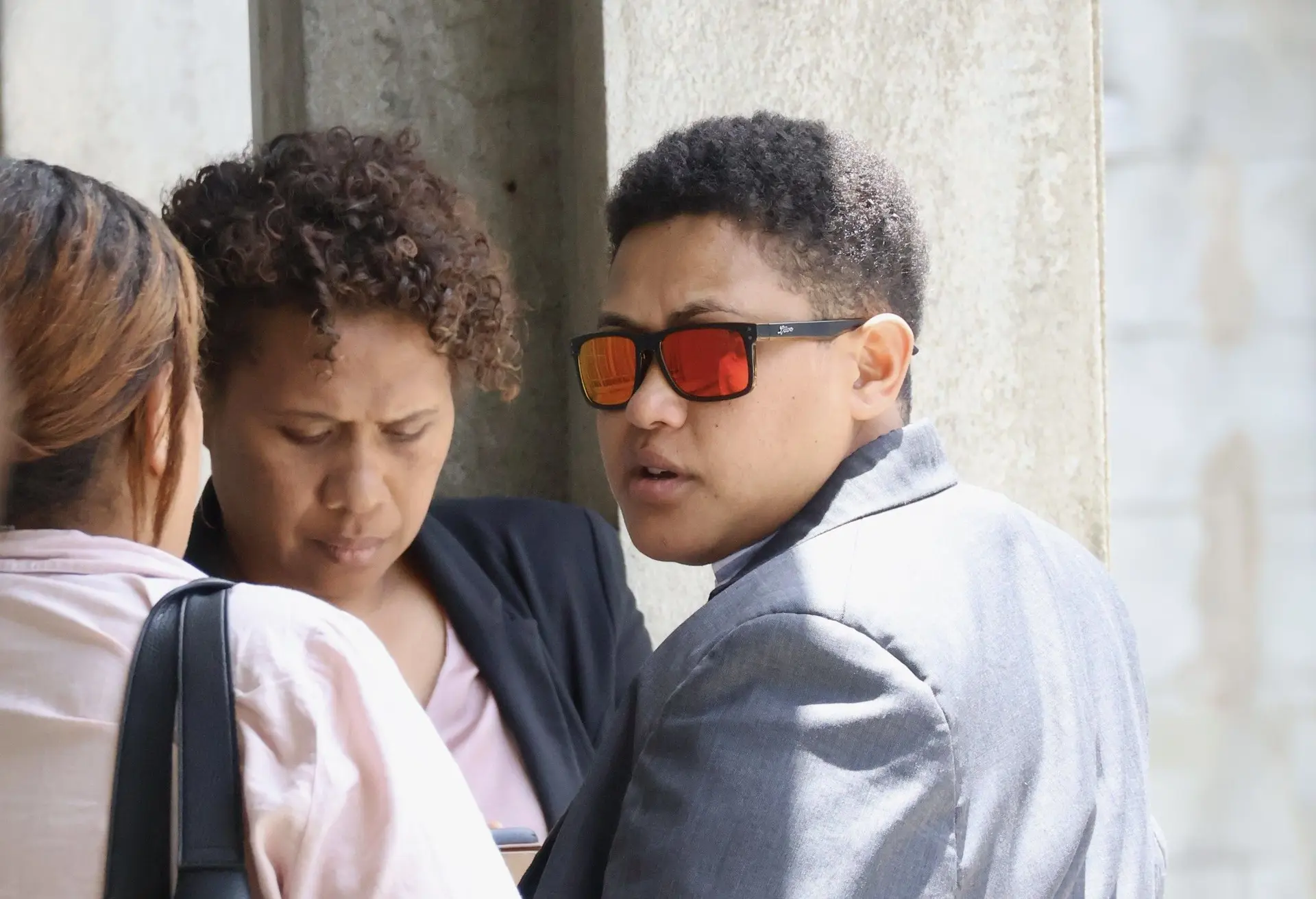 Elizabeth Sautu (wearing sunglasses) outside the Suva Magistrate Court on October 15, 2025.