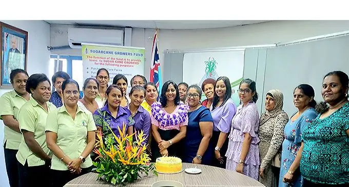Director Research, Planning and Policy of the Ministry of Sugar Reshmi Kumari (with garland) surrounded by staff members of the Sugar Cane Growers Fund, Sugar Cane Growers Council and women cane farmers during International Women’s Day celebrations in Lautoka, on March 8, 2022. Photo: Nicolette Chambers.