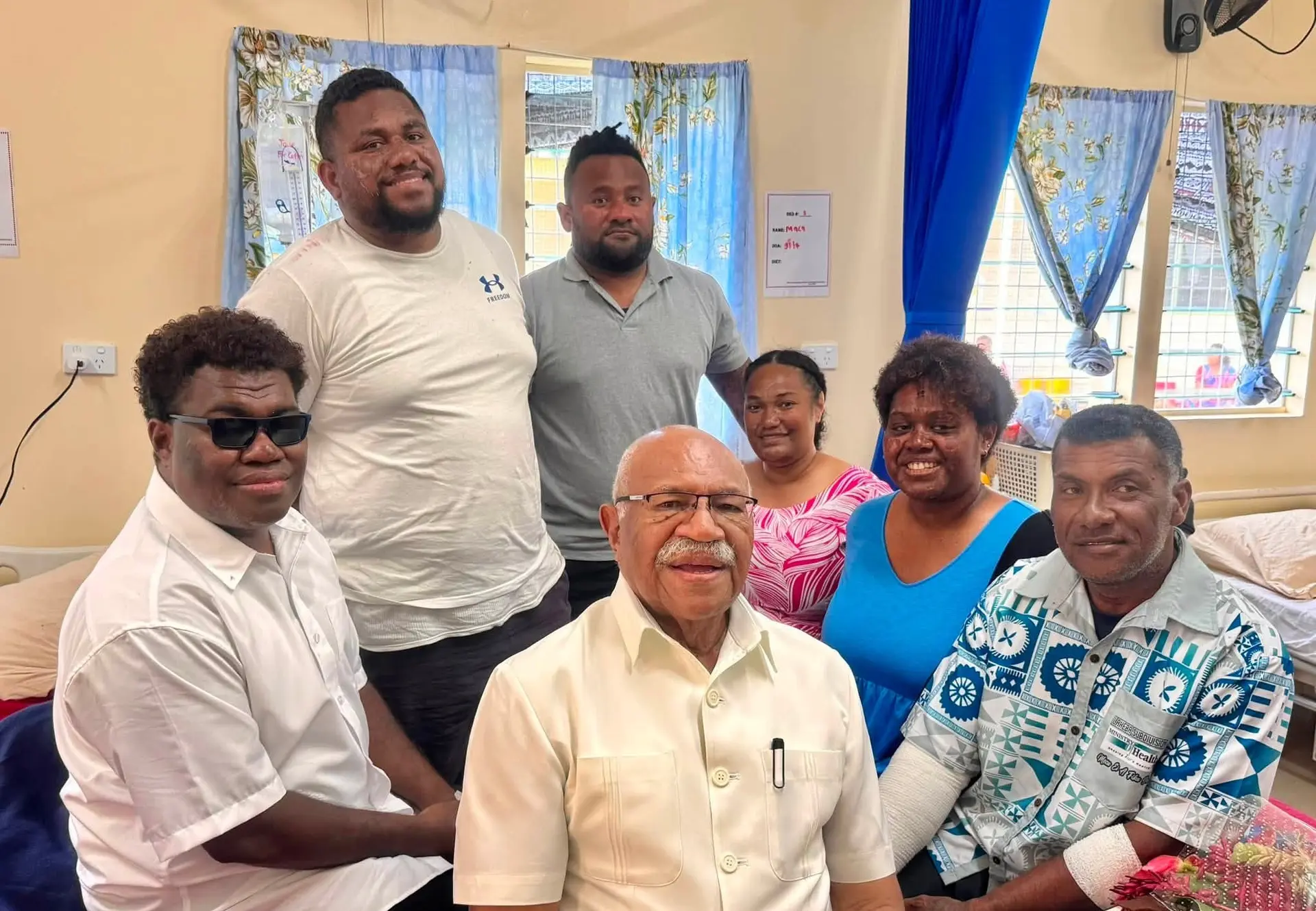 Prime Minister Sitiveni Rabuka (front, middle) with the survivors of the sea ordeal, Livinai Namami (left), Dr Jone Tuiwai (back, second from left), Viliame Sasa (back, third from left), Maca Lutunauga (back, third from right), Dr Luse Tamani (second from right) and boat operator Risiate Senilagakali. Photo: Fiji Government