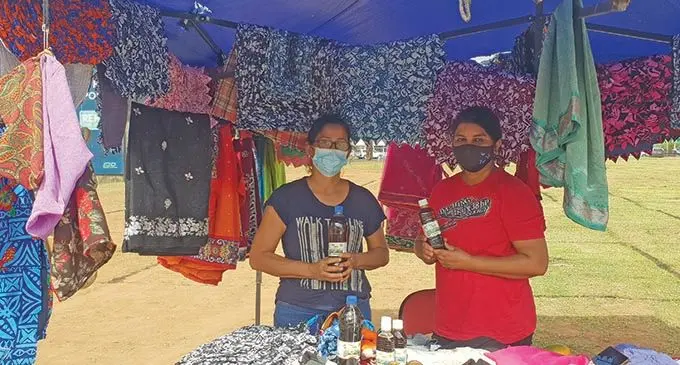 Back in business, Lautoka Outdoor Flea Market vendor, Shobna Singh (left) with another stall vendor, Vinita Lata (right) at the Carnival Grounds. Photo: Nicolette Chambers