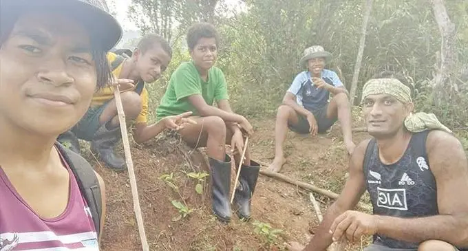 TOP: Teacher Rajneel Rohitesh (right) with some of the students in the  highlands of Navosa.  