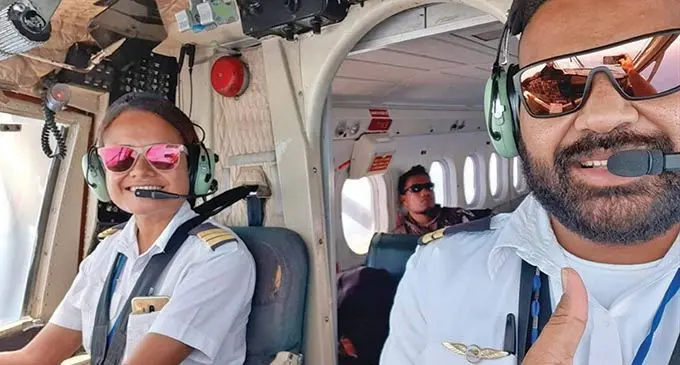 Sailosi Kamikamica Rova (right) with his work colleague Salote Vuniwaqa Mataitini getting ready for take off.