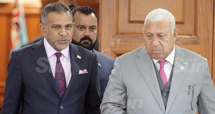Minister for Trade and Acting Attorney General Faiyaz Koya (from left), Assistant Minister forn Employment Alvick Maharaj and Prime Minister Voreqe Bainimarama outside Parliament on March 23, 2021. Photo: Ronald Kumar.