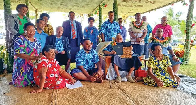 Turaga na Tui Wainikeli, Ratu Talemo Ratakele, (sitted beside) Prime Minister, Sitiveni Rabuka, (backrow-second from right-garland) Minister for Lands and Mineral Resources, Filimoni Vosarogo, during the handing over at Naselesele Village, Taveuni on May 12, 2023. Inset: Yavusa Wainikeli working committee chairman, Julian Hennings. Photo: Sampras Anand