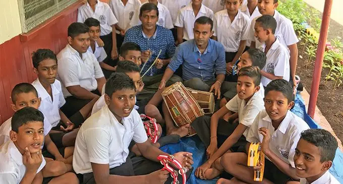Labasa Sangam Primary School students and teacher, Anish Raj and assistant head teacher Hemant Jass recited special devotional songs called, Faag during the Holi celebration in Labasa on March 20, 2019. Photo: Shratika Naidu