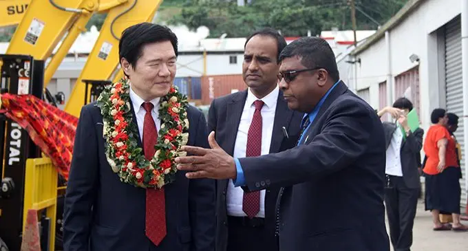 Japan’s Ambassador to Fiji Masahiro Omura (left), with Minister Mahendra Reddy (right).