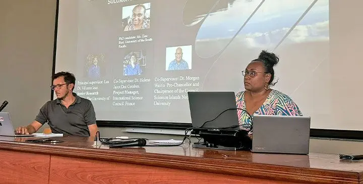 Zina Bird (right), during her PhD thesis defence.
