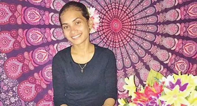 Lasharika Alaina Richmond with her lei’s (Ei Katu).
