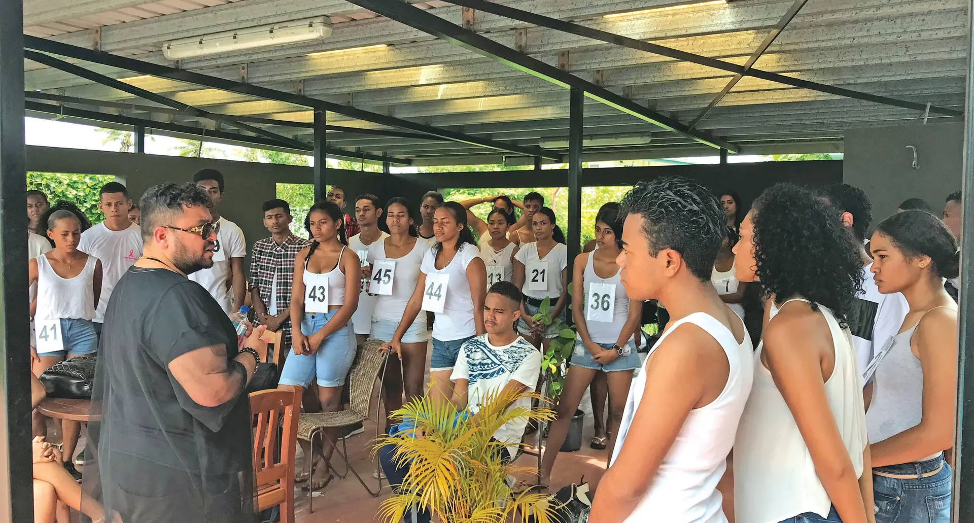 Faraz Ali, chairman of the Fashion Council of Fiji, speaks to young people who turned up for the Fijian Fashion Festival Western division model call in Nadi on February 17, 2018.  
