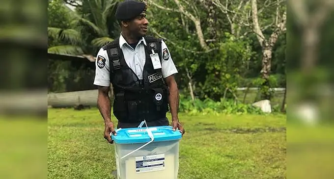 Constable Peniasi Waitabu braving the rain and cold weather at Udu Village in Naitasiri on December 8, 2022. Photo: Nacanieli Tuilevuka