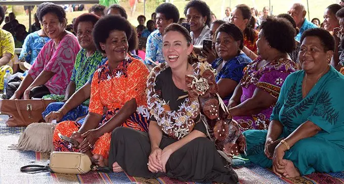 Visiting New Zealand Prime Minister Jacinda Ardern joins the women from Tamavua-i-Wai during her visit to the RISE informal settlement project on February 26, 2020. 