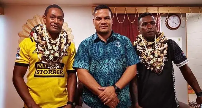 Tuvalu Minister of Justice Simon Kofe (middle) with Epeli Yasava Kamikamica (left) and Samuela Dolesau at Funafuti International Airport on December 24, 2019.