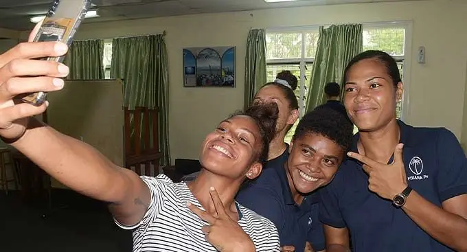From left: Fijiana sevens squad member Verenaisi Bari takes a selfie with teammates Maria Rokotuisiga, Laisana Moceisawana and Talei Wilson (back) in camp at the Pacific Theological College on December 27, 2022. Photo: Ronald Kumar