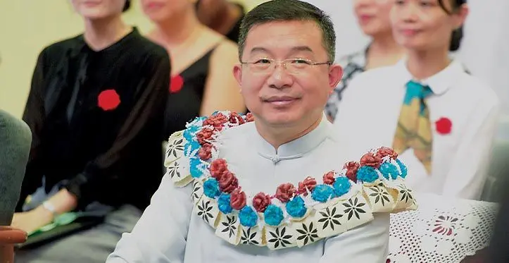 Chinese Ambassador Zhou Jian (with garland) during his Yat Sen school special welcome assembly at the Yat Sen Hall on March 14, 2023. Photo: Ronald Kumar