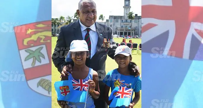 Prime Minister Voreqe Bainimarama with sisters Saanvi and Sahana Naidu following the Fiji Day parade at Albert park on October 10, 2019. Photo: Ronald Kumar