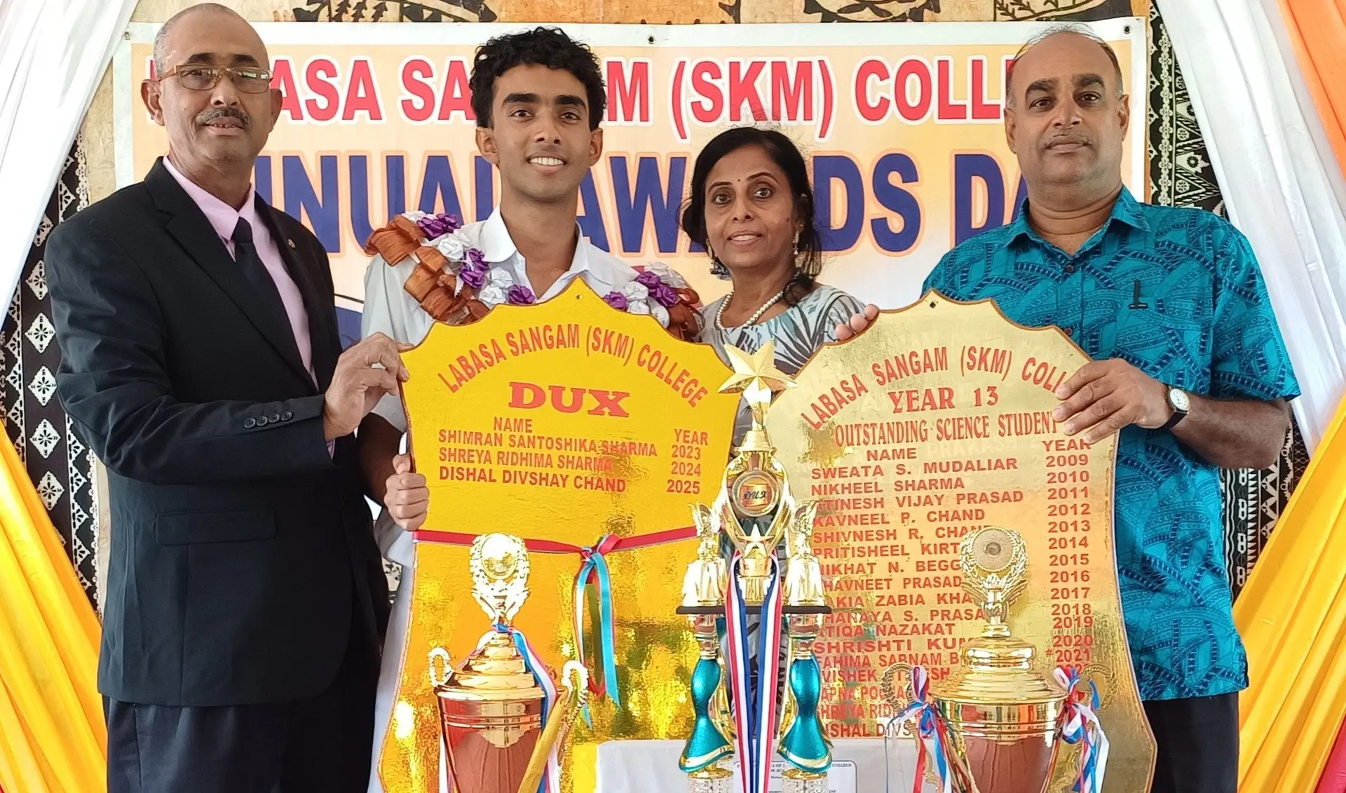 Labasa Sangam (SKM) College dux, Dishal Chand, with his parents, Satishwar Chand and Ronika Devi, and the school principal, Ishwar Prasad (left), in Labasa on December 3, 2025.