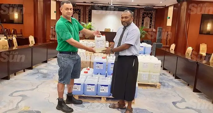 Fiji Chemicals director Darran Bentley Fisher and the Minister for Health and Medical Services Dr Ifereimi Waqainabete at the Suva Civic Centre on May 21, 2020. Photo: Shalveen Chand
