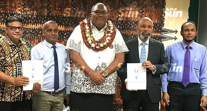 From left: Fiji Rice chairman Raj Sharma, acting permanent secretary for Agriculture Vinesh Kumar, President of Fiji Ratu Wiliame Katonivere, Fiji Development Bank chief executive officer, Saud Minam, and general manager finance and administration, Saiyad Hussain, following the signing of a memorandum of understanding between Fiji Rice and Fiji Development Bank, in Suva, on November 24, 2021. Photo: Frederica Elbourne