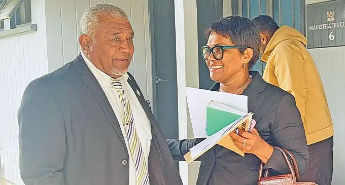From left: Former Minister for Fisheries and Forestry Kalaveti Ravu and his lawyer, Lavi Rokoika, outside the Suva Magistrate’s Court on September 19, 2024. Photo: Berandeta Nagatalevu