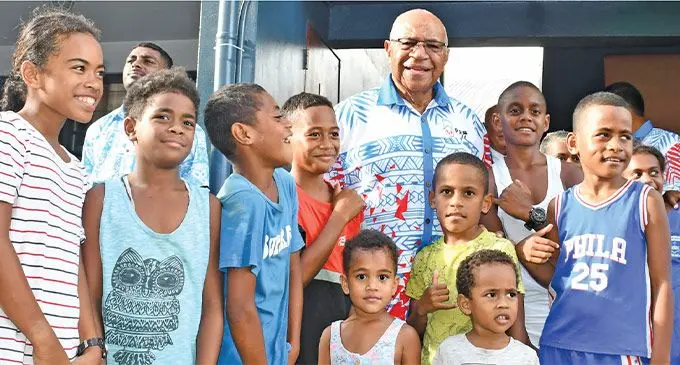 Prime Minister Sitiveni Rabuka with children after opening the flats at Lagilagi Housing, Raiwasa, Suva, on January 29, 2025. Photo: Ronald Kumar