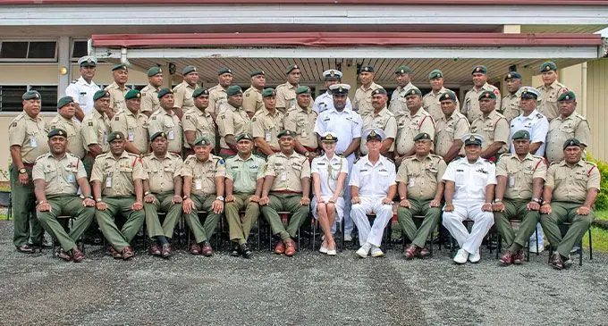 New Zealand Defence Force NZ Defence Force Defence Attaché Commander (CDR) Sarah Bamfield (sitting seventh from left), with Senior Warrant Officers and other senior officers of the Republic of Fiji Military Forces at the Queen Elizabeth Barracks in Nabua, Suva, on February 16, 2023. Photo: RFMF Media Cell