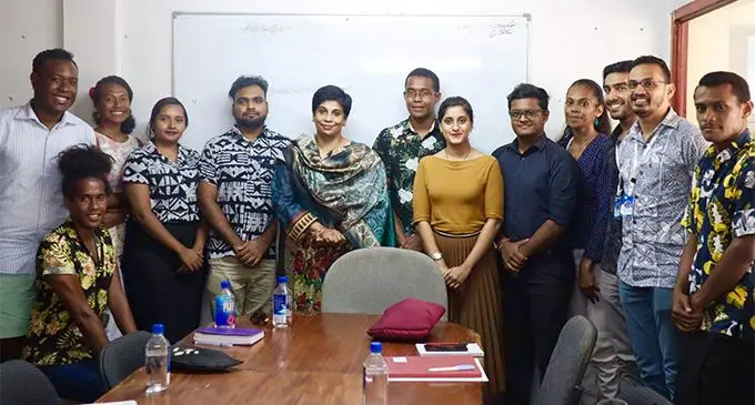 Pictured in the middle, Ambassador Khan with youth leaders.