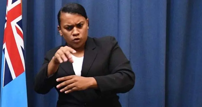 Melita Delaibau Cook interprets the Prime Minister Voreqe Bainimarama’s statement.
